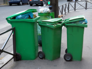 Three plastic garbage tanks